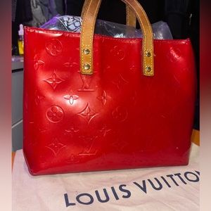 Loui Vuttion reade pm bag in red . 100% Authentic